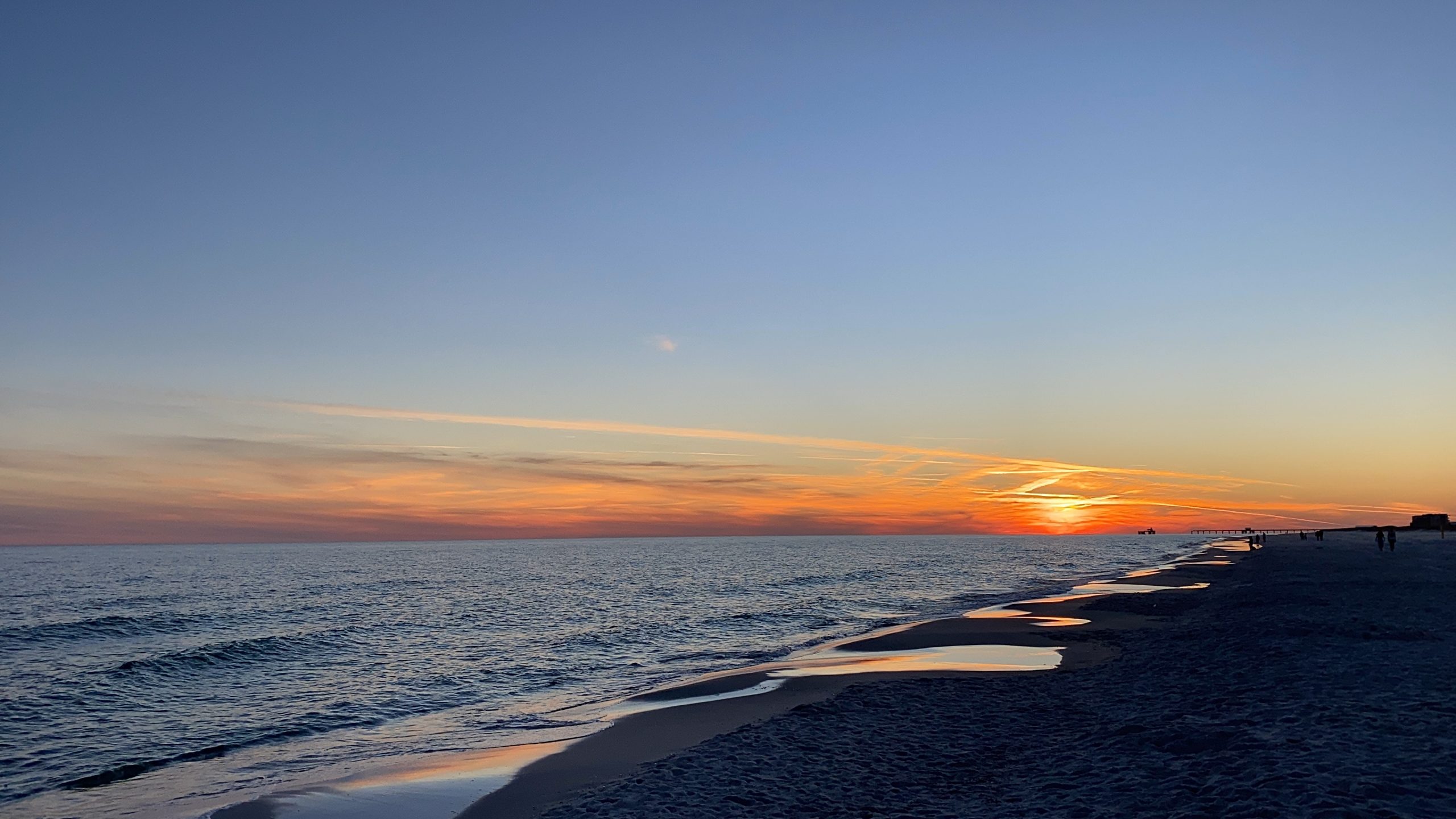 Photo of a beach at dawn.